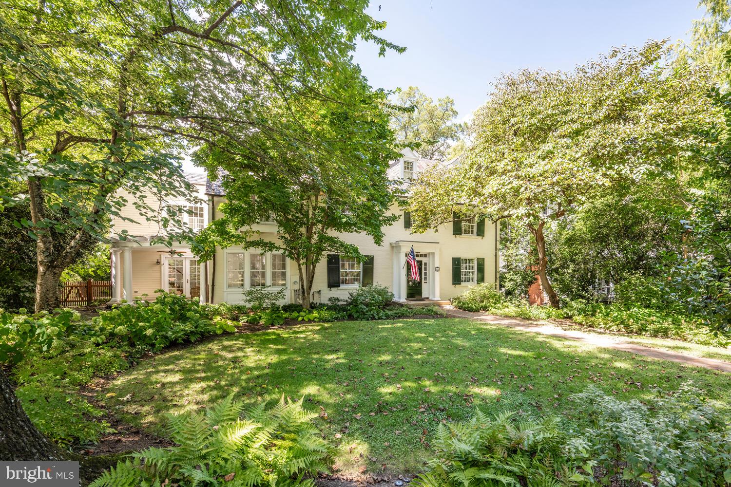 5804 Cedar Parkway Chevy Chase, MD 20815 - Photo 2 of 95 a front view of a house with a yard