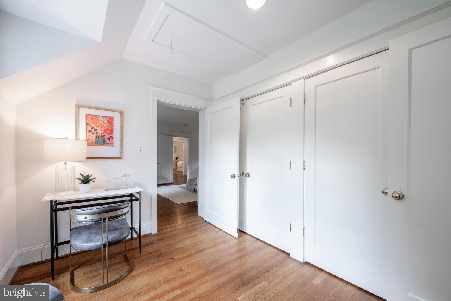 5804 Cedar Parkway Chevy Chase, MD 20815 - Photo 46 of 95 a view of a room with wooden floor lounge chair and windows