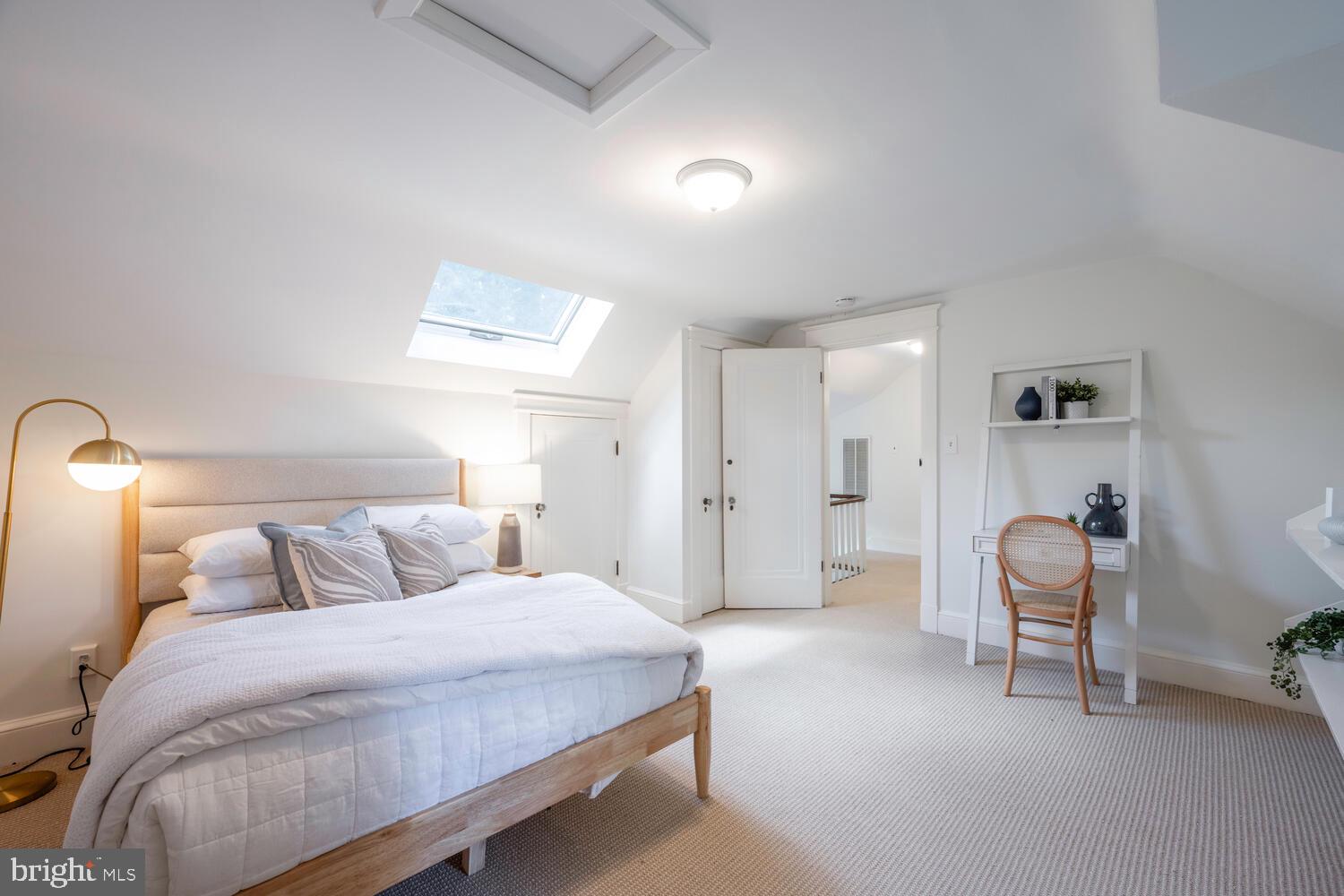 5804 Cedar Parkway Chevy Chase, MD 20815 - Photo 59 of 95 a bedroom with a bed and chair