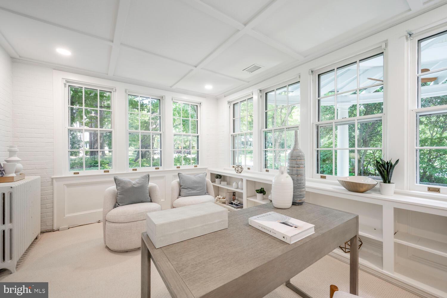 5804 Cedar Parkway Chevy Chase, MD 20815 - Photo 6 of 95 a living room with furniture and large windows