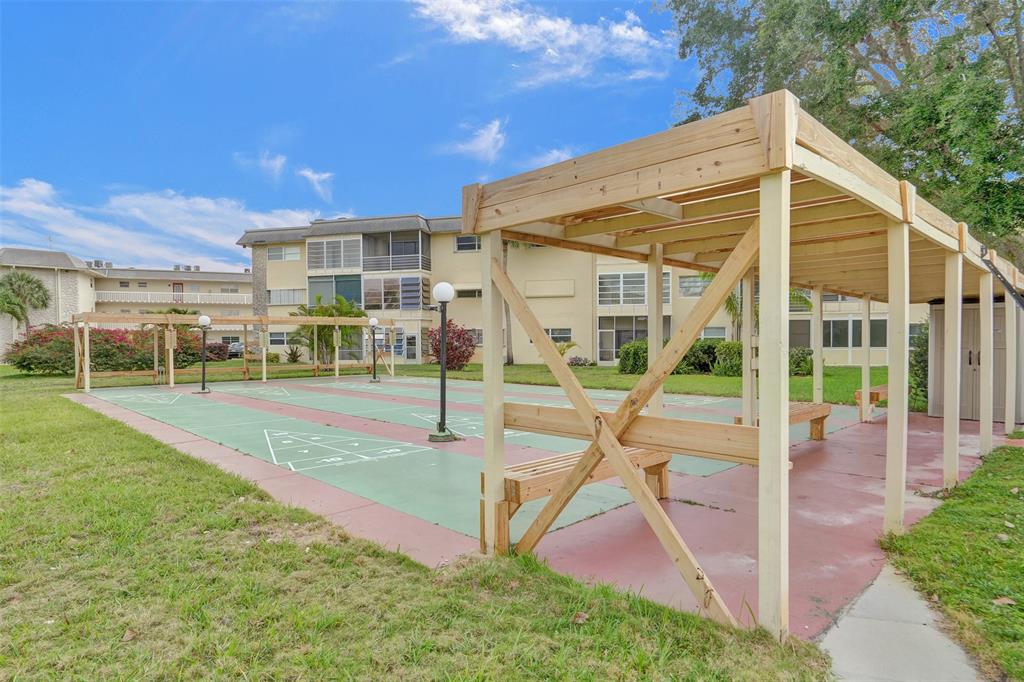 4431 Northwest 16th Street, Unit 209 Lauderhill, FL 33313 - Photo 27 of 27 a view of a house with backyard