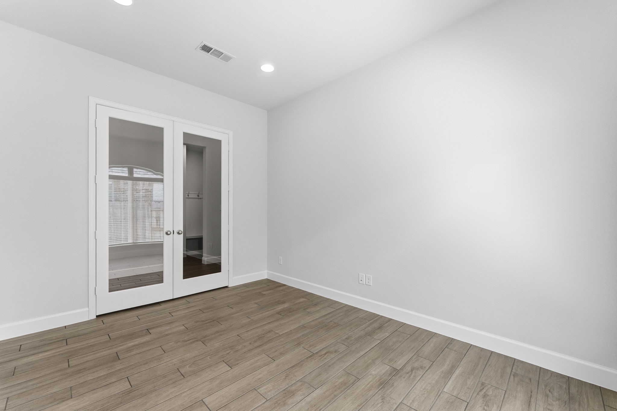 15618 Turtlehead Trail Conroe, TX 77302 - Photo 20 of 50 Flex Room/Home Office with Tile Flooring and Dual Glass Doors for Privacy