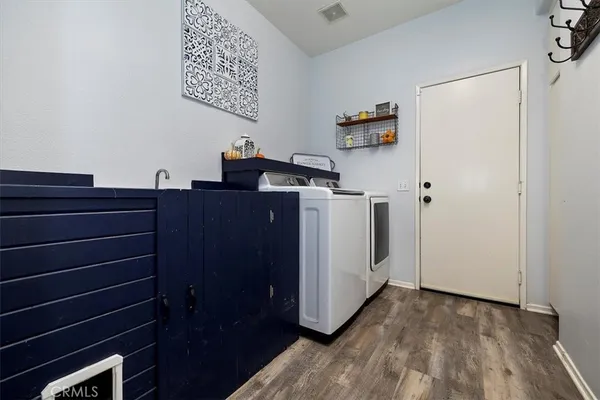 a view of a storage & utility room with washer and dryer