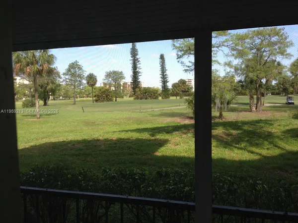 a view of a field with an outdoor space