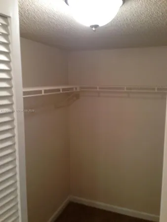 a view of small space with racks on the wall