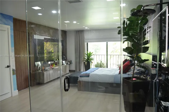 a view of a house with backyard sitting area and garden