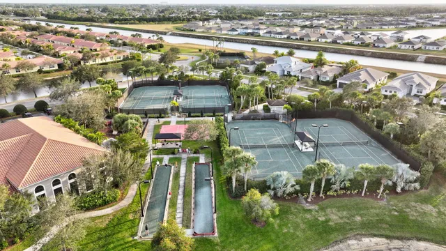 an aerial view of residential houses with outdoor space