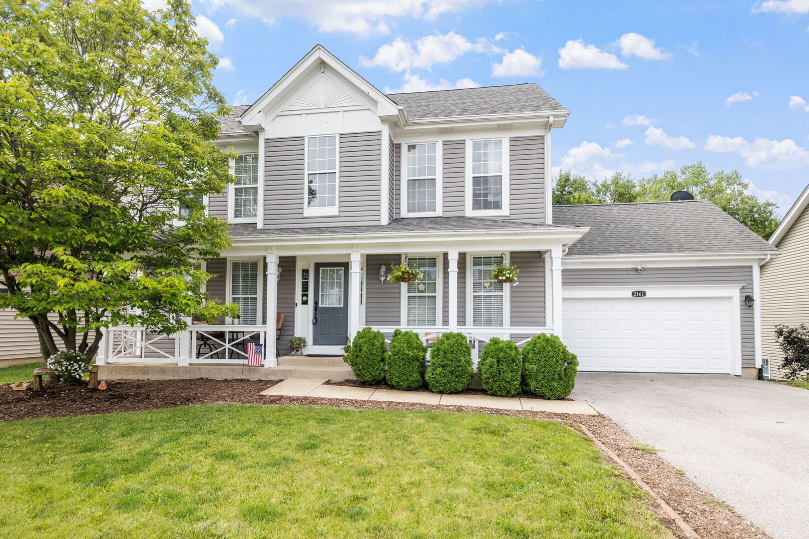 2161 Hammel Lane Aurora, IL 60504 - Photo 1 of 33 a front view of a house with garden