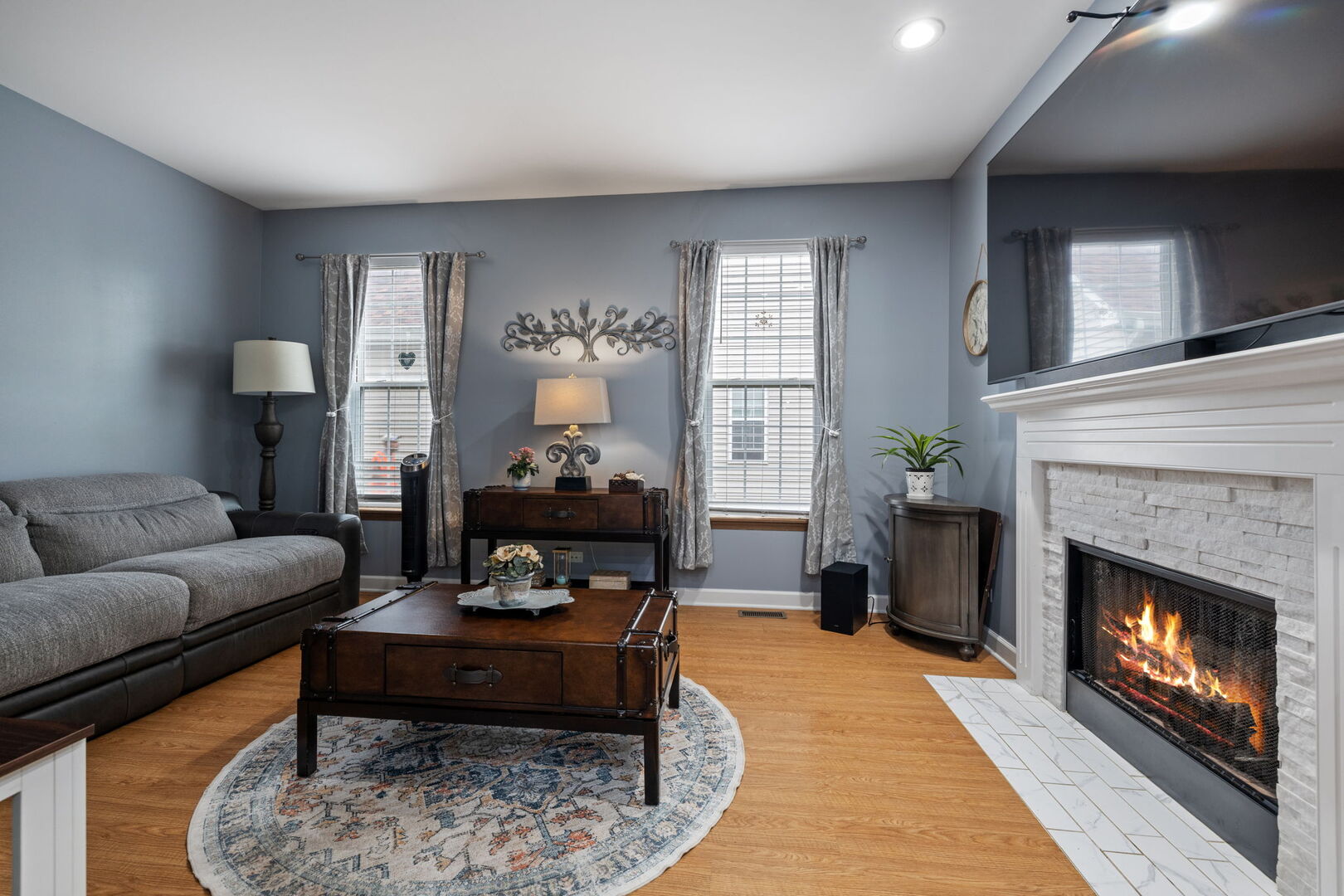 2161 Hammel Lane Aurora, IL 60504 - Photo 10 of 33 a living room with furniture and a fireplace
