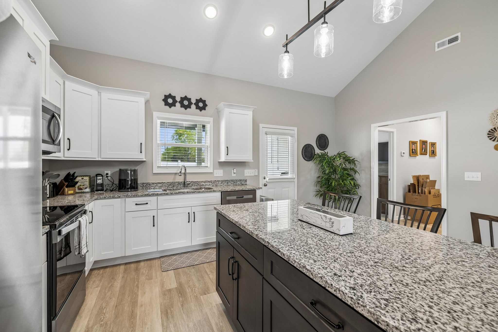 180 Vickers Hill Road Smithville, TN 37166 - Photo 13 of 33 a kitchen with sink stove and refrigerator