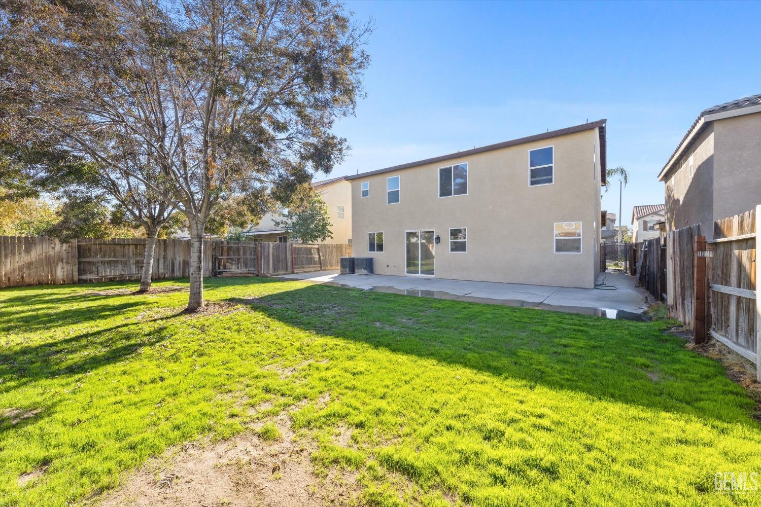 Undisclosed Address Bakersfield, CA 93313 - Photo 33 of 34 a view of a house with backyard and a tree