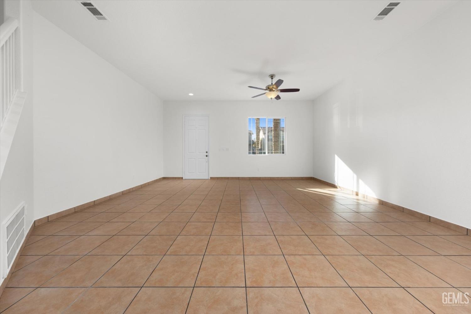 Undisclosed Address Bakersfield, CA 93313 - Photo 6 of 34 a view of an empty room with a window