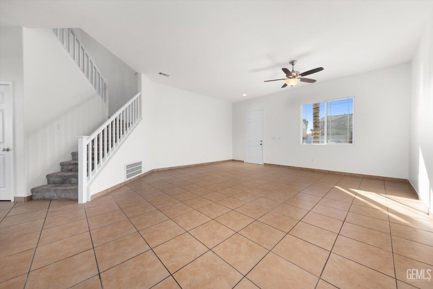 Undisclosed Address Bakersfield, CA 93313 - Photo 7 of 34 a view of an empty room with a window
