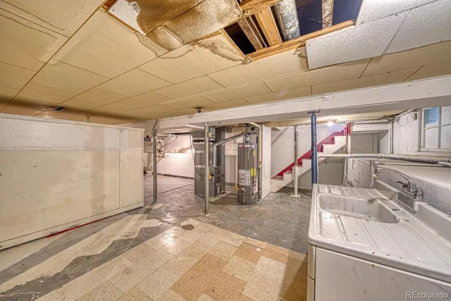 a view of house with a swimming pool and furniture