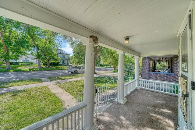 a view of a porch with garden