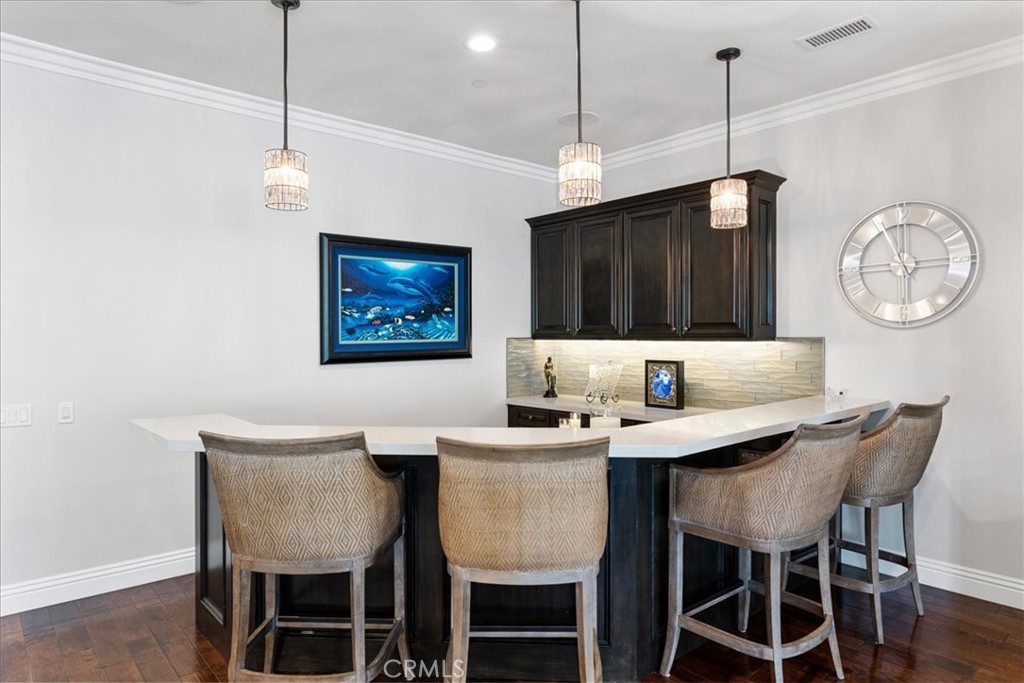 2510 Belleview Road Upland, CA 91784 - Photo 11 of 59 a view of a dining room with furniture wooden floor and chandelier