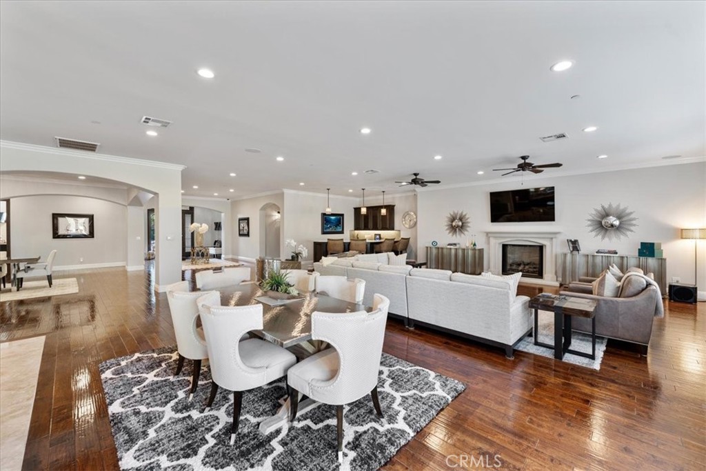 2510 Belleview Road Upland, CA 91784 - Photo 16 of 59 a living room with fireplace furniture and a wooden floor