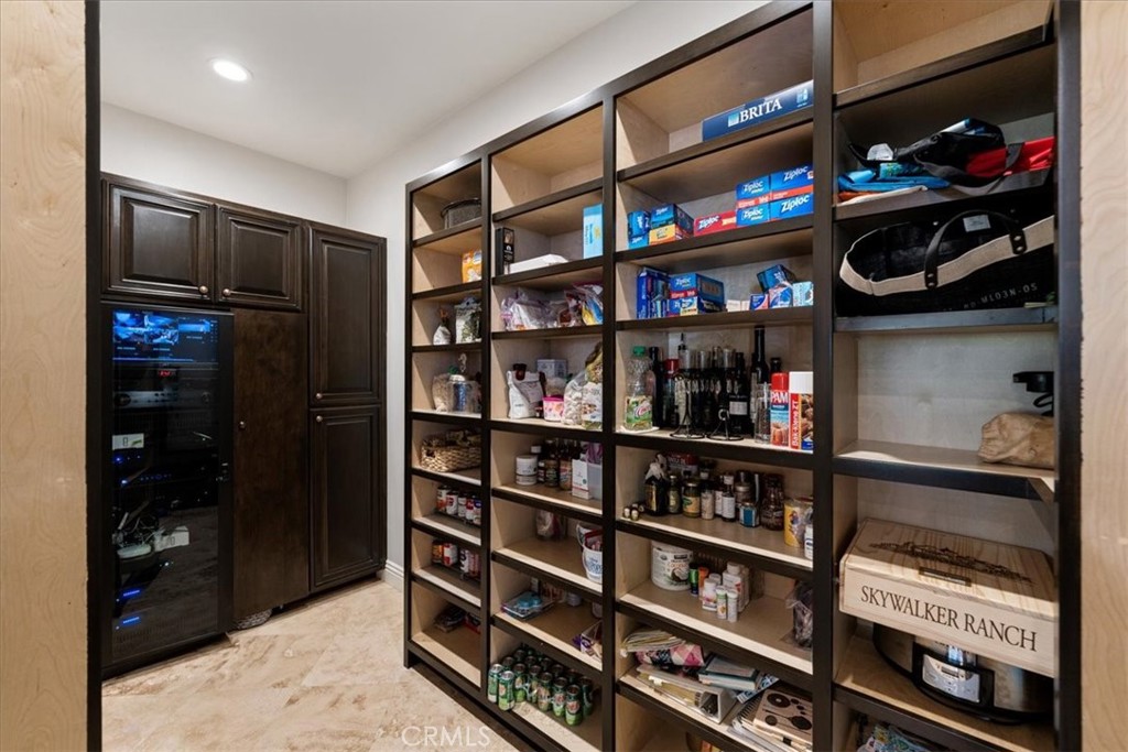 2510 Belleview Road Upland, CA 91784 - Photo 21 of 59 a room with storage and a flat screen tv