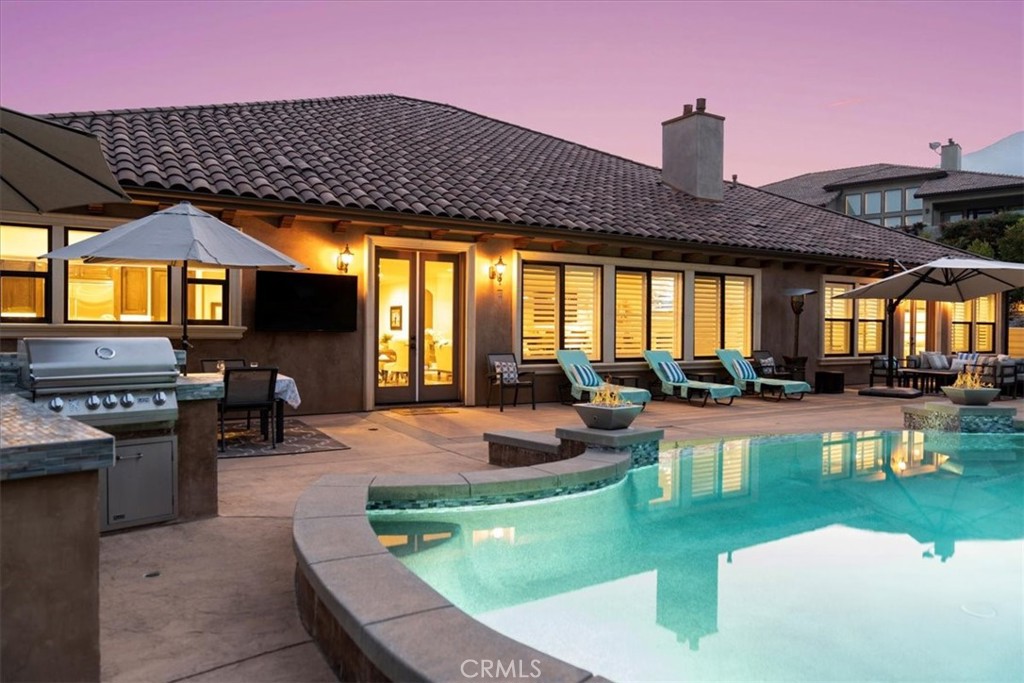 2510 Belleview Road Upland, CA 91784 - Photo 54 of 59 a view of a house with swimming pool and sitting area