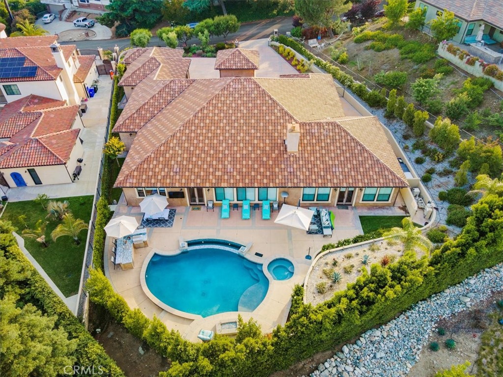 2510 Belleview Road Upland, CA 91784 - Photo 57 of 59 an aerial view of a house with swimming pool and garden