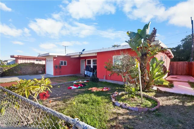 a view of a yard with an outdoor space