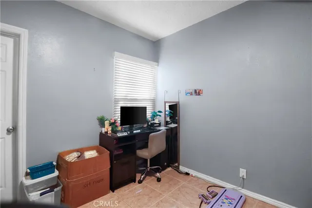 a room with furniture and a window