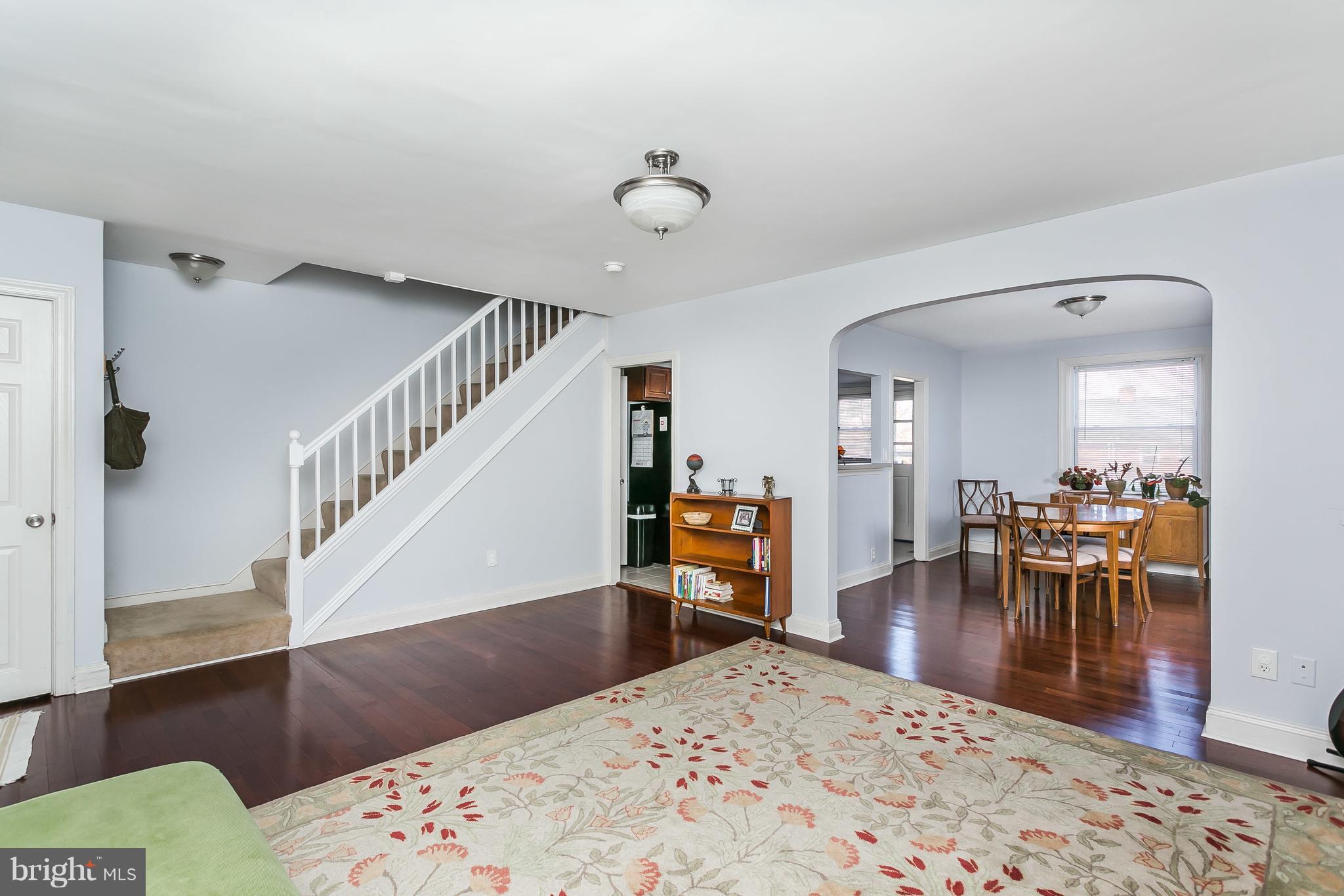 902 Andover Road Baltimore, MD 21218 - Photo 1 of 30 a living room with furniture and a dining table