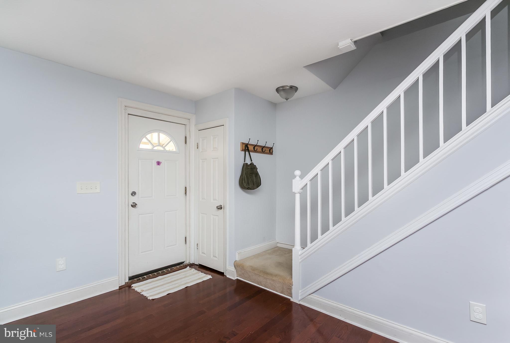 902 Andover Road Baltimore, MD 21218 - Photo 2 of 30 a view of an entryway with staircase