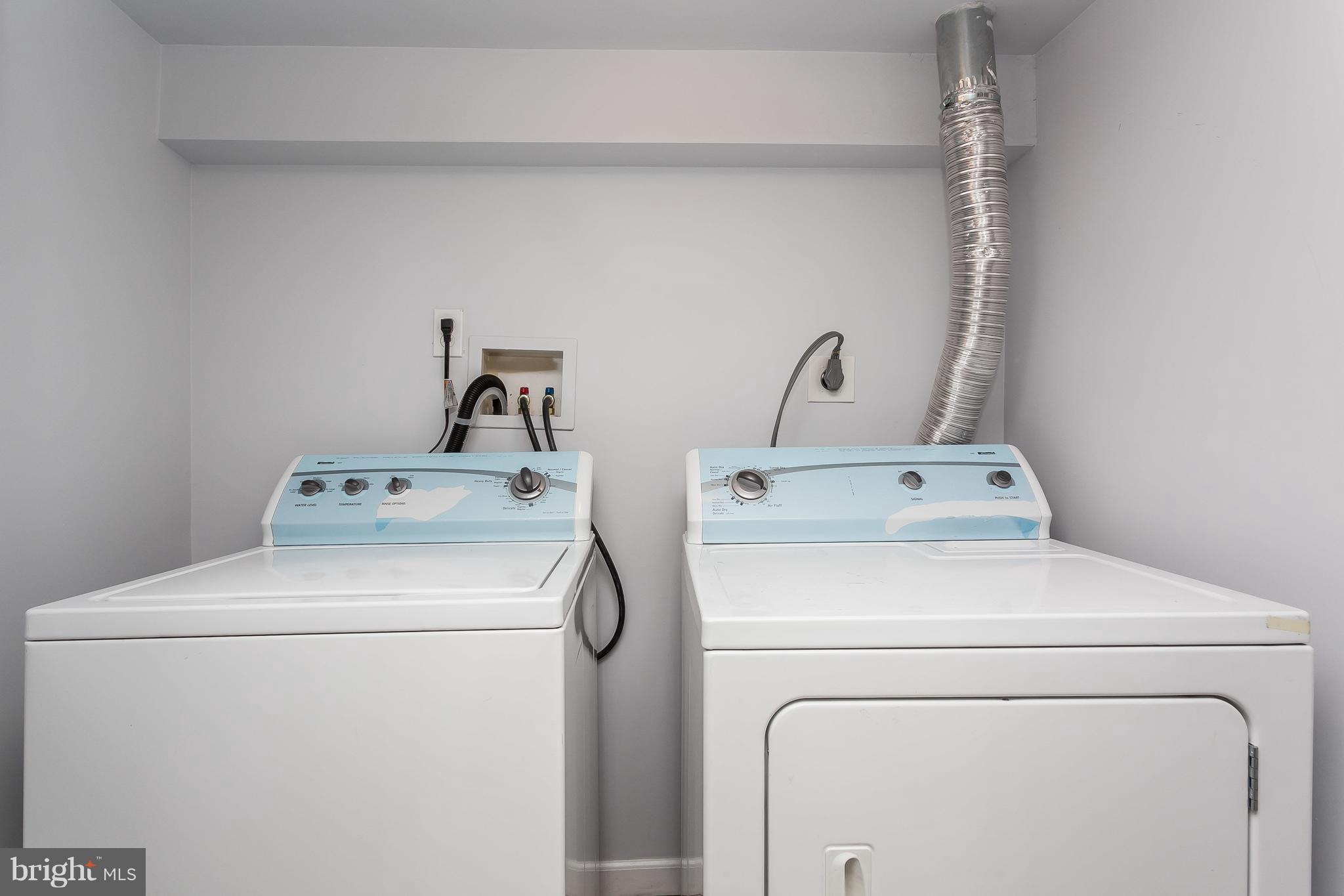 902 Andover Road Baltimore, MD 21218 - Photo 22 of 30 a utility room with dryer and washer