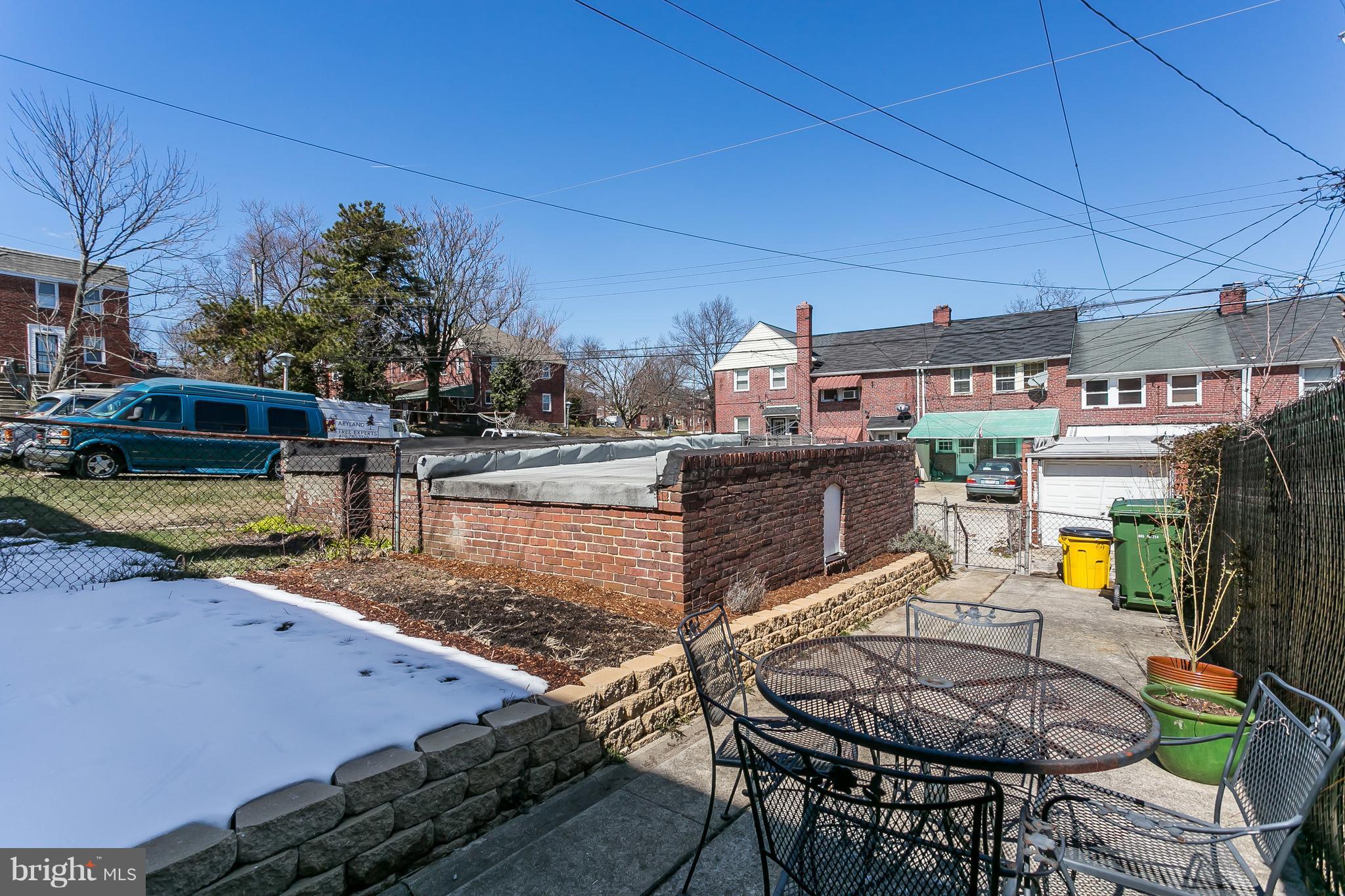 902 Andover Road Baltimore, MD 21218 - Photo 23 of 30 a view of a chairs and table in the patio