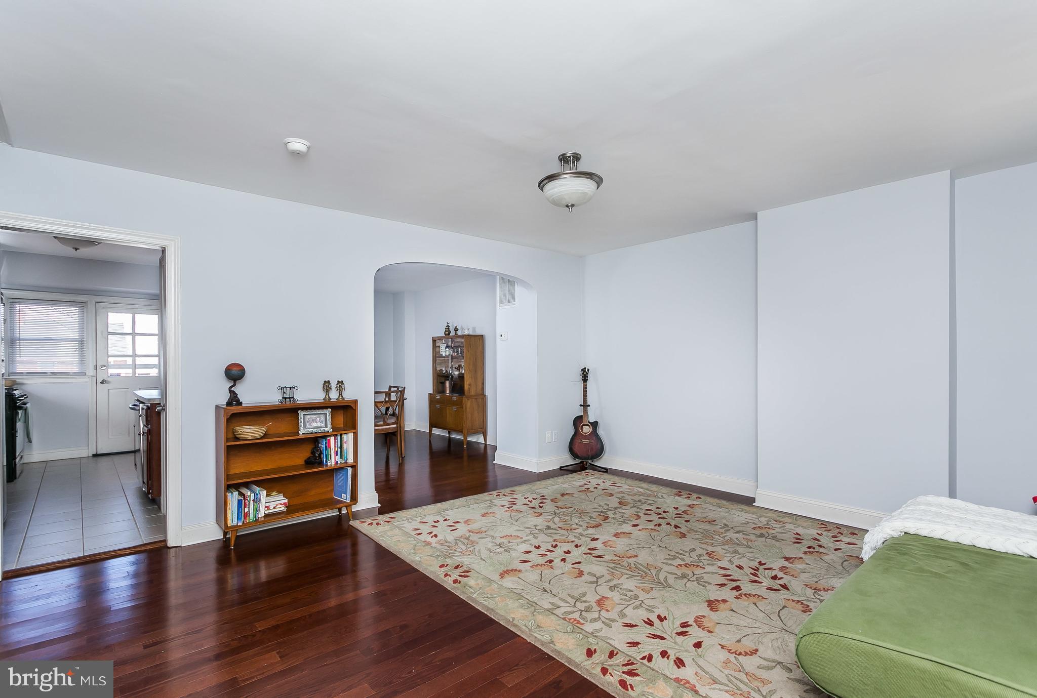 902 Andover Road Baltimore, MD 21218 - Photo 4 of 30 a view of a bedroom with wooden floor