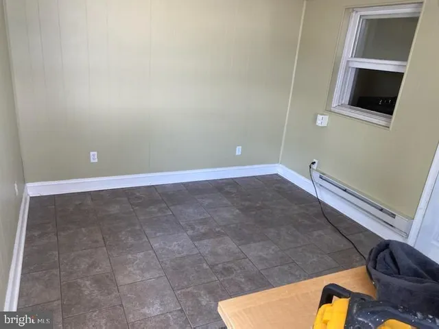 a view of a livingroom with furniture