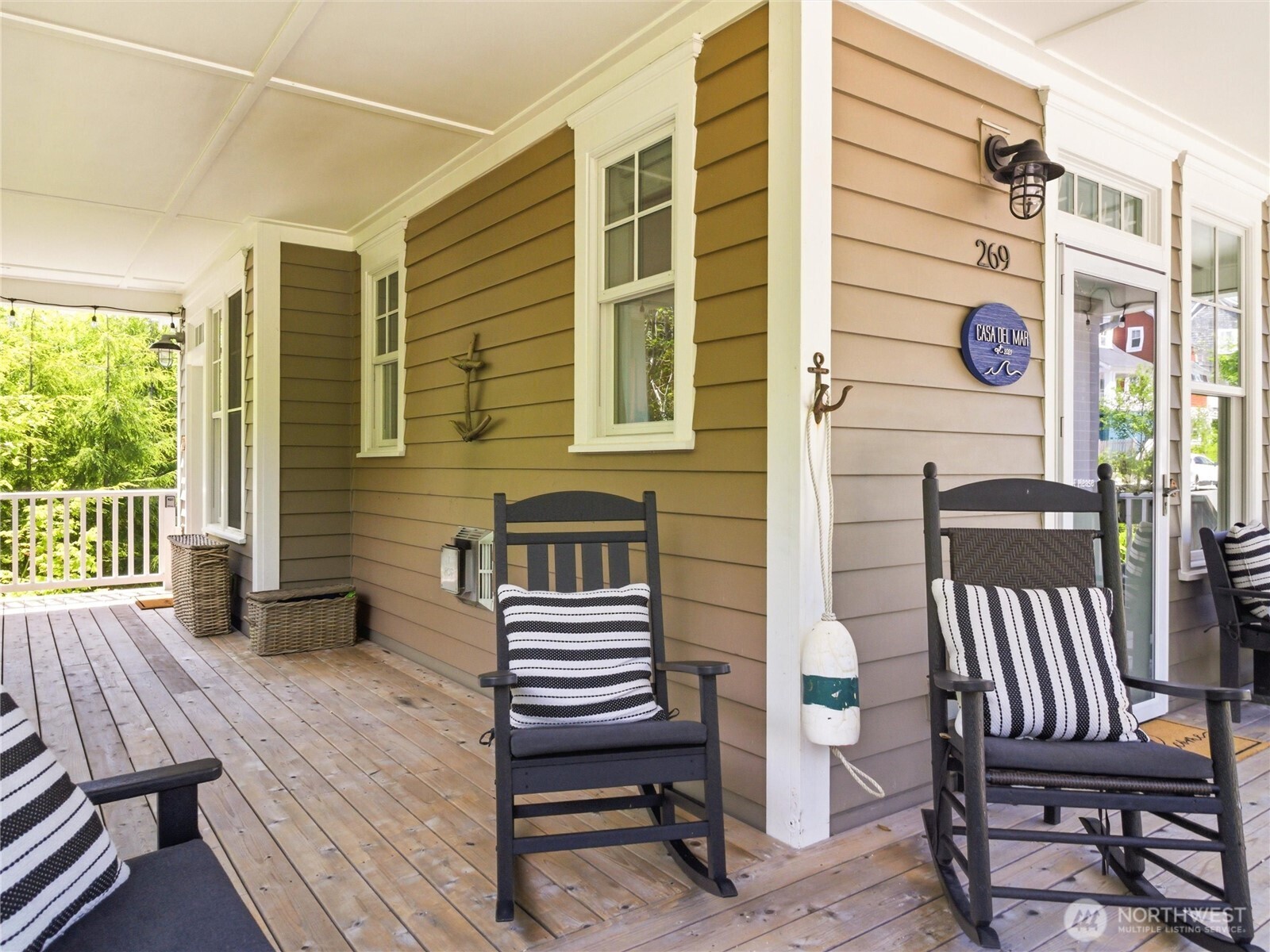 269 Compass Street Pacific Beach, WA 98571 - Photo 4 of 38 a view of a patio with a table and chairs