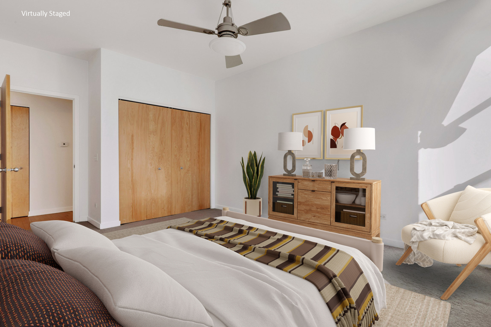 1910 South State Street, Unit 303 Chicago, IL 60616 - Photo 12 of 19 a bedroom with a bed and ceiling fan