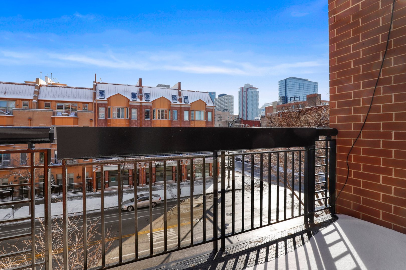 1910 South State Street, Unit 303 Chicago, IL 60616 - Photo 15 of 19 a view of swimming pool from a balcony