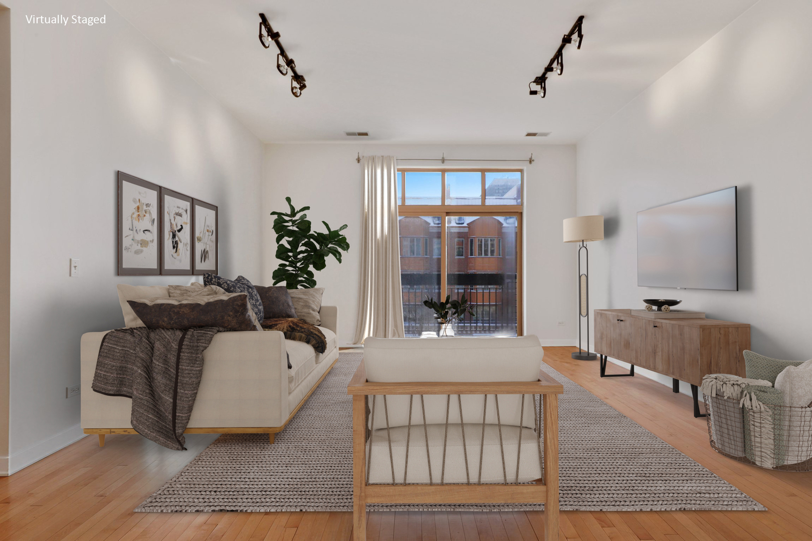 1910 South State Street, Unit 303 Chicago, IL 60616 - Photo 2 of 19 a living room with furniture and a wooden floor
