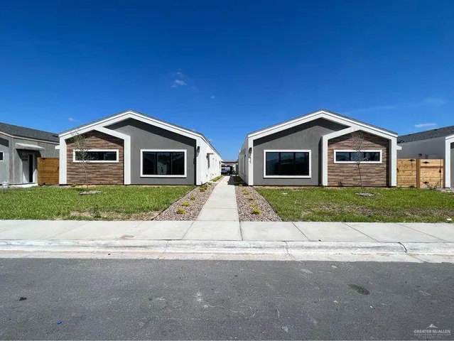 a front view of house with yard