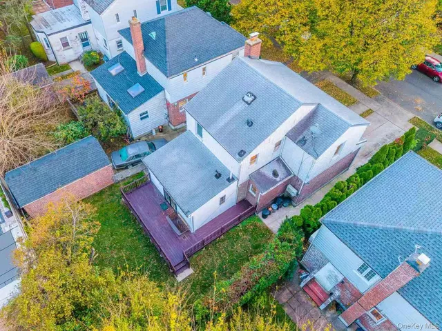 an aerial view of a house with a garden