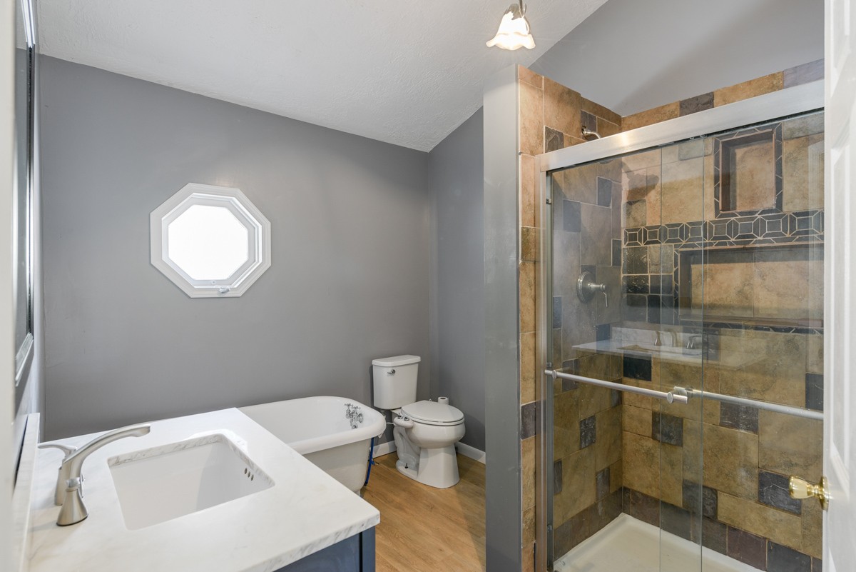 1840 Garrison Branch Road Cottontown, TN 37048 - Photo 18 of 41 Main Bath features a beautful clawfoot tub & walk-in shower.