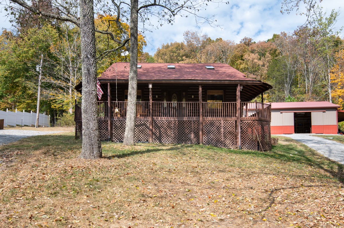 1840 Garrison Branch Road Cottontown, TN 37048 - Photo 3 of 41 Over 22 acres and workshop/storage/garage for your toys!