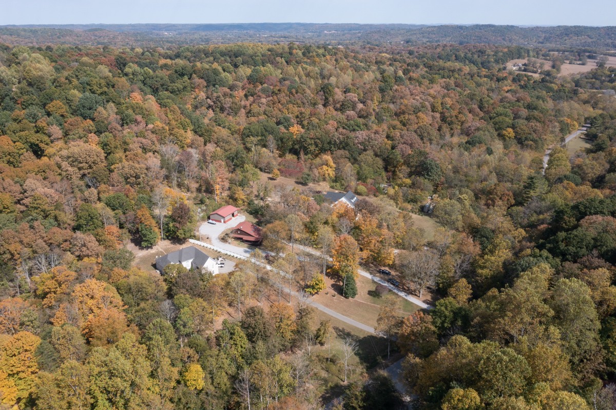 1840 Garrison Branch Road Cottontown, TN 37048 - Photo 32 of 41 Arial view of the home/workshop/surrounding land and structures.