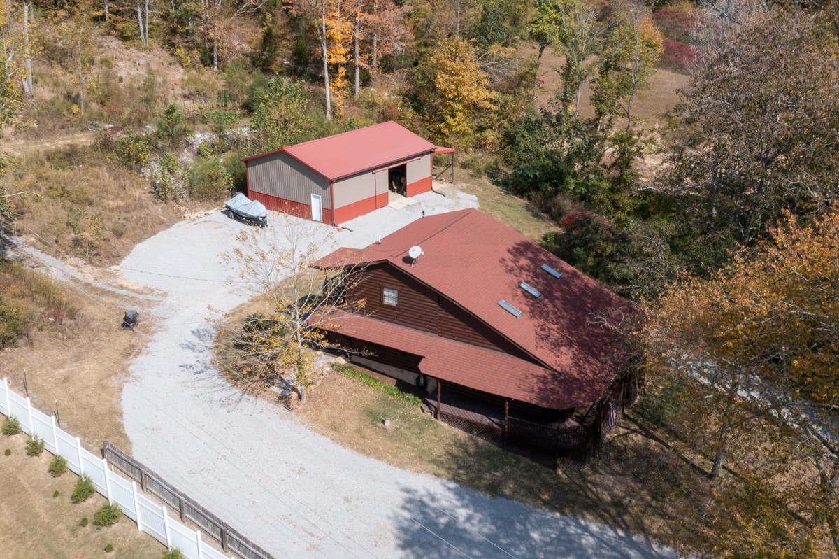 1840 Garrison Branch Road Cottontown, TN 37048 - Photo 4 of 41 Arial view of home & workshop and the beautiful trees!