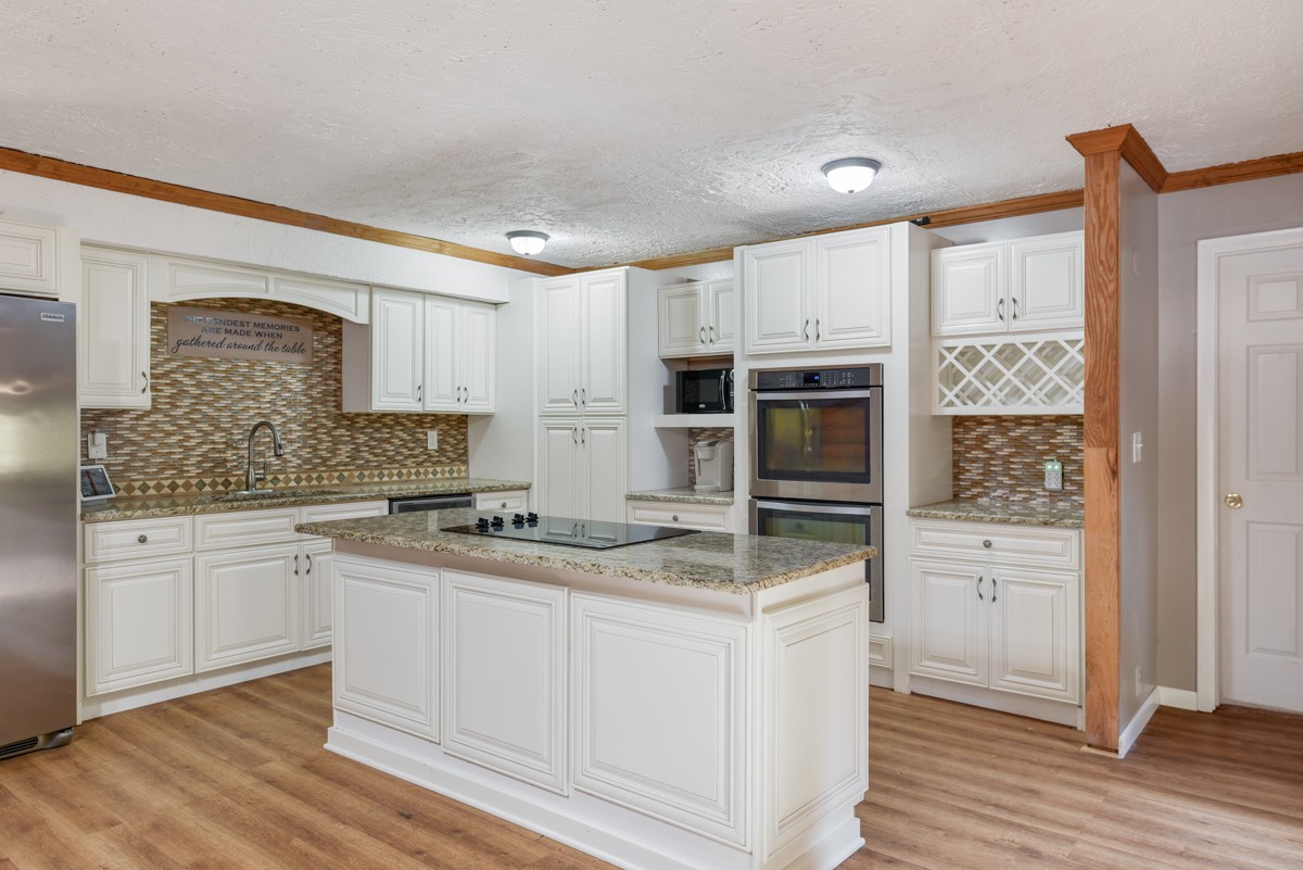 1840 Garrison Branch Road Cottontown, TN 37048 - Photo 7 of 41 Wall oven & Microwave, smooth cooktop in island, all stainless appliances