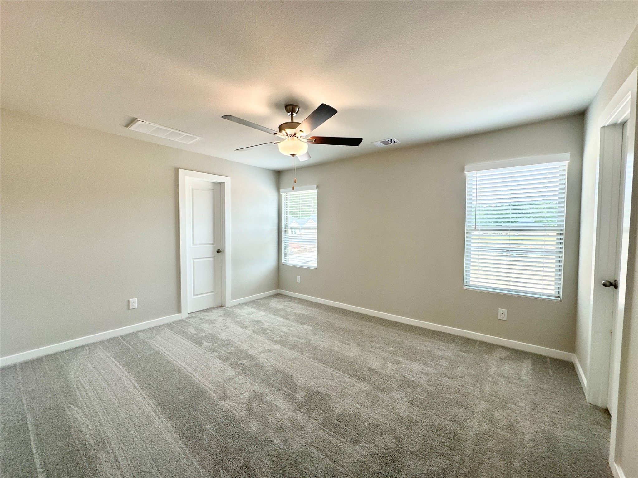 12198 Ridge Top Drive Conroe, TX 77304 - Photo 11 of 27 a view of an empty room with a window