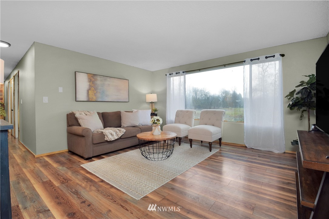 35704 Reese Road Sultan, WA 98294 - Photo 4 of 35 a living room with furniture and a large window
