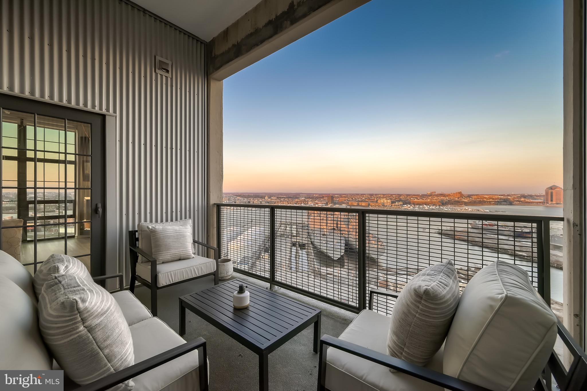 1200 Steuart Street, Unit 1611 Baltimore, MD 21230 - Photo 31 of 34 a balcony with furniture