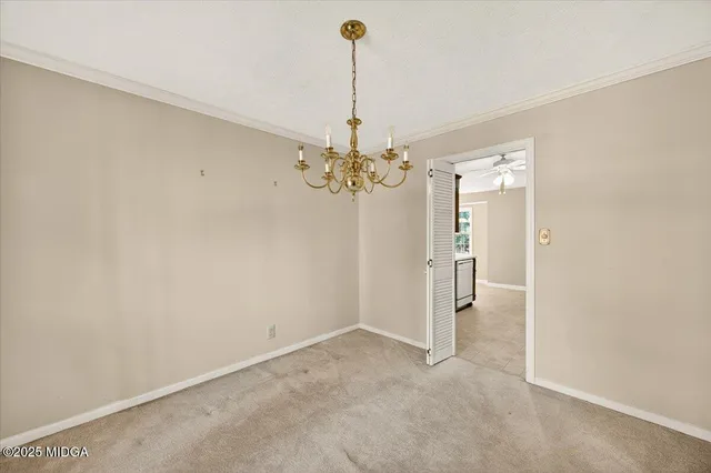 a view of a chandelier in a room