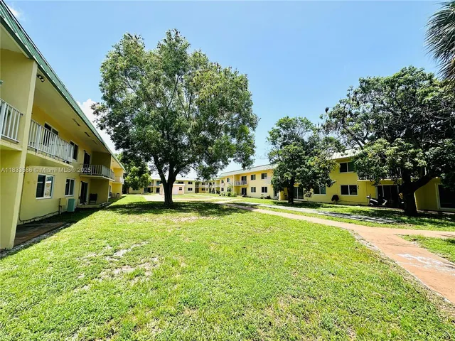 a view of an empty room and mirror