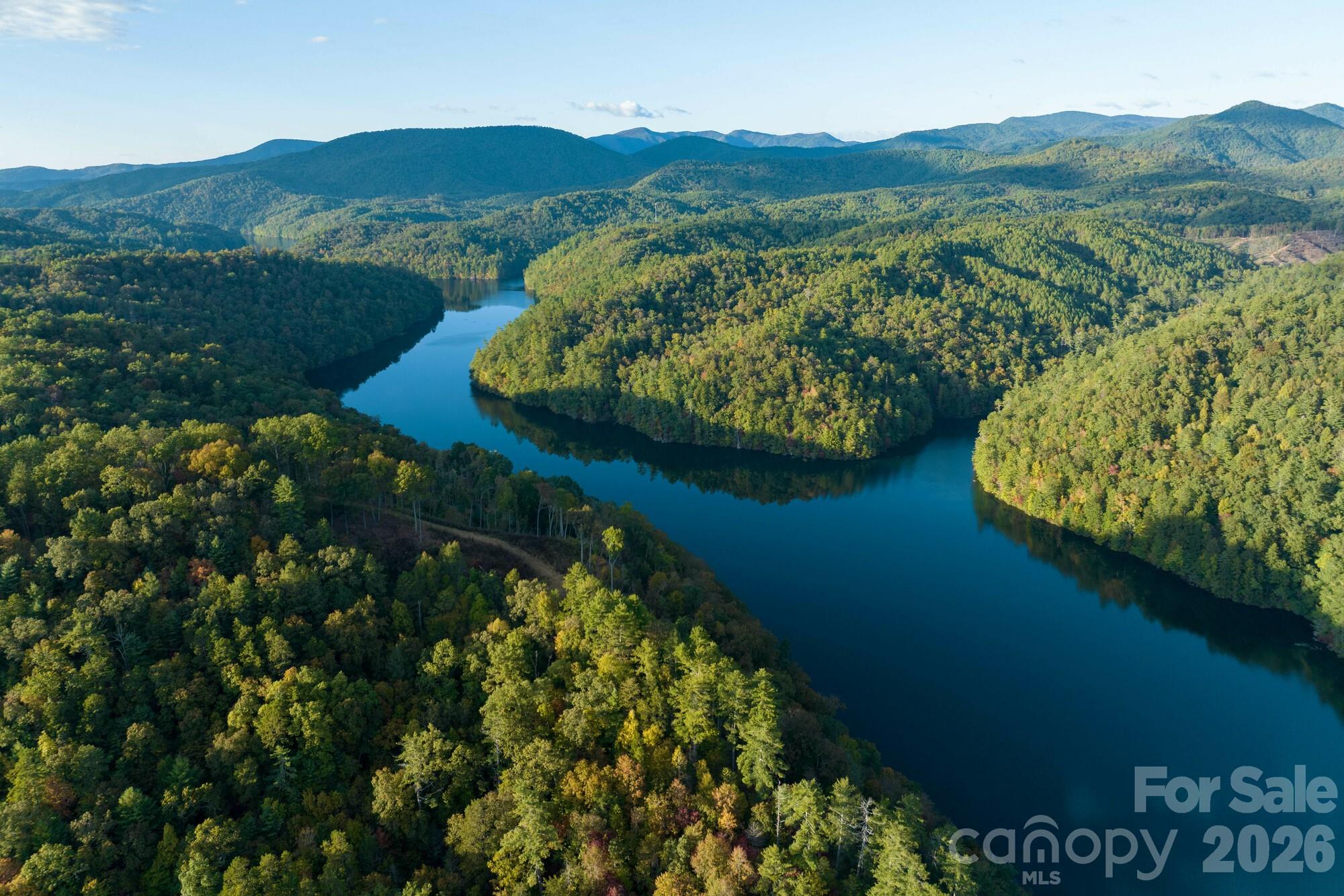 2108 River Hill Road Murphy, NC 28906 - Photo 13 of 31 a view of a lake with a mountain