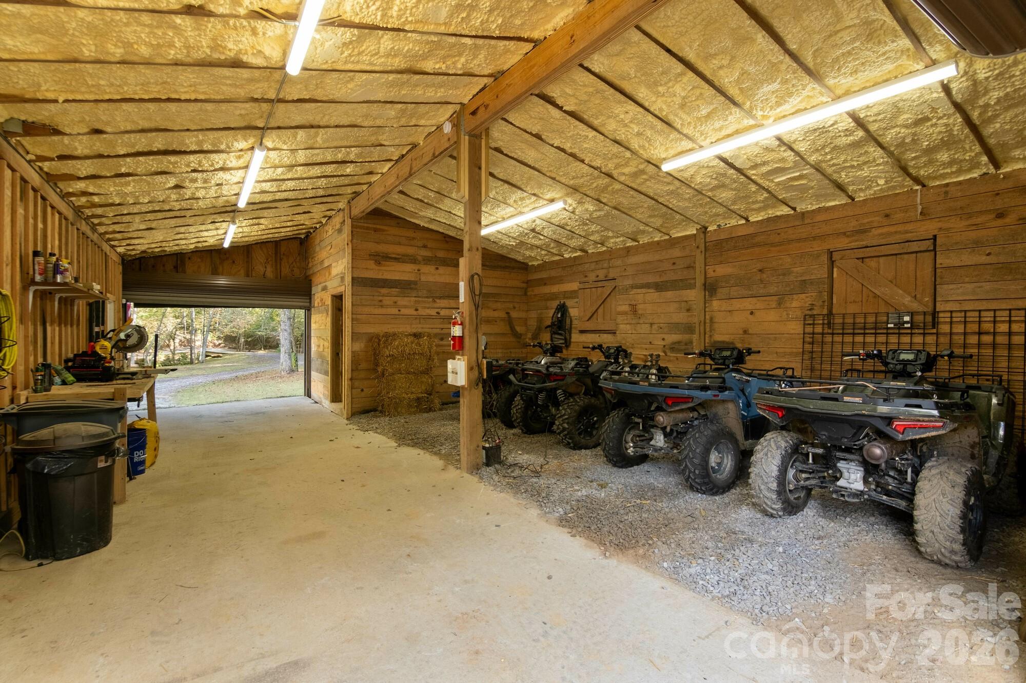 2108 River Hill Road Murphy, NC 28906 - Photo 21 of 31 a view of a garage with a bike and car